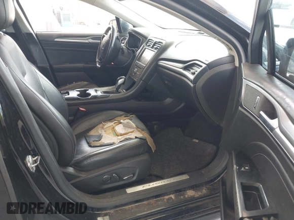 2016 Ford Fusion Titanium with VIN 3FA6P0K99GR235692, listed as a IAAI auction lot 42587743 with 169,467 mi miles and . Bid and sale history available at DreamBid. Image 5.