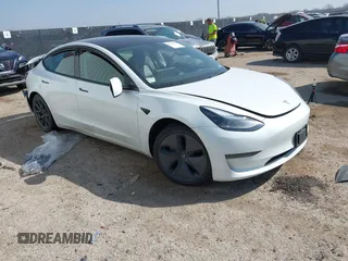 2021 Tesla Model 3 Standard Range Plus z VIN 5YJ3E1EA0MF095222, wystawiony jako IAAI lot #41799178 z przebiegiem 85 894 mil mil oraz . Historia ofert i sprzedaży dostępna na DreamBid. Obrazek 1.