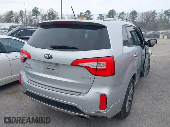 2015 Kia Sorento SX with VIN 5XYKWDA73FG633458, listed as a IAAI auction lot 41728711 with 74,160 mi miles. Bid and sale history available at carsss.com. Image 4.