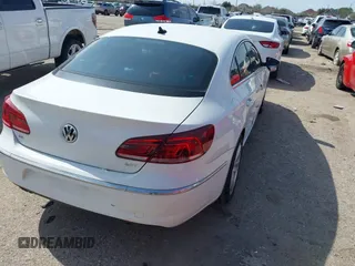 2013 Volkswagen CC Sport with VIN WVWBN7AN5DE503125, listed as a IAAI auction lot 41581088 with 128,964 mi miles and . Bid and sale history available at DreamBid. Image 4.