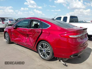 2017 Ford Fusion Titanium with VIN 3FA6P0K98HR207447, listed as a IAAI auction lot 42422213 with 59,549 mi miles and . Bid and sale history available at DreamBid. Image 3.