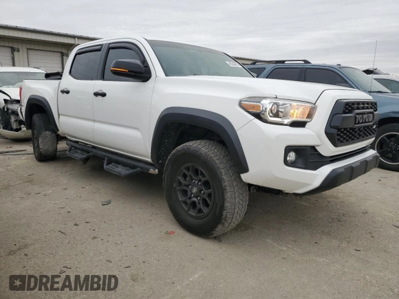 2016 Toyota Tacoma SR with VIN 3TMCZ5AN4GM021273, listed as a Copart auction lot 48243655 with 132,225 mi miles and Salvage Title. Bid and sale history available at carsss.com. Image 4.