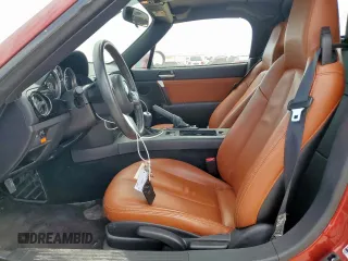 2008 Mazda MX-5 Miata Grand Touring z VIN JM1NC26F180144365, wystawiony jako Copart lot #58216365 z przebiegiem 56 990 mil mil oraz Szkoda całkowita • Salvage title. Historia ofert i sprzedaży dostępna na DreamBid. Obrazek 7.