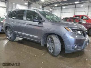 2021 Honda Passport EX-L with VIN 5FNYF8H5XMB021767, listed as a Copart auction lot 54408453 with 33,857 mi miles. Bid and sale history available at carsss.com. Image 4.
