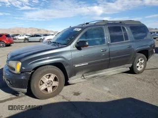 2004 Chevrolet TrailBlazer EXT LT with VIN 1GNET16P946208721, listed as a Copart auction lot 82648204 with 209,910 mi miles and Salvage Title. Bid and sale history available at carsss.com. Image 1.