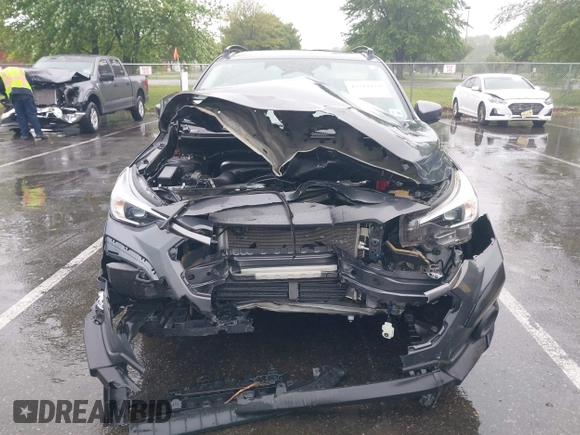 2024 Subaru Crosstrek Premium with VIN JF2GUADC3R8218799, listed as a IAAI auction lot 42311122 with 22,108 mi miles and . Bid and sale history available at DreamBid. Image 6.