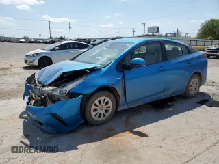 2020 Toyota Prius L Eco z VIN JTDKARFU3L3125646, wystawiony jako Copart lot #52942245 z przebiegiem 104 999 mil mil oraz Szkoda całkowita • Salvage title. Historia ofert i sprzedaży dostępna na DreamBid. Obrazek 1.