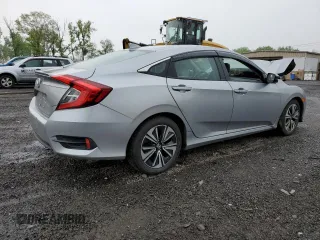 2017 Honda Civic EX-L z VIN 19XFC1F74HE209787, wystawiony jako Copart lot #56352415 z przebiegiem 130 264 mil mil oraz Szkoda całkowita • Salvage title. Historia ofert i sprzedaży dostępna na DreamBid. Obrazek 3.