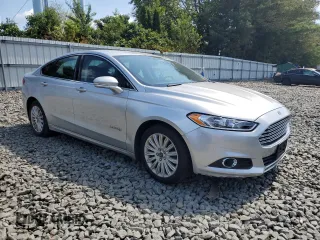 2013 Ford Fusion SE Hybrid with VIN 3FA6P0LU9DR217546, listed as a Copart auction lot 66597775 with Not provided miles and Clean title. Bid and sale history available at DreamBid. Image 4.