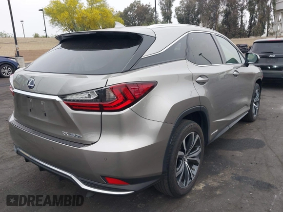 2022 Lexus RX 450h with VIN 2T2HGMDA7NC072735, listed as a IAAI auction lot 42356852 with 62,835 mi miles and . Bid and sale history available at DreamBid. Image 4.