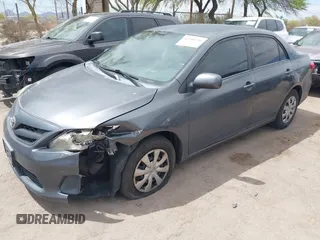 2011 Toyota Corolla L with VIN 2T1BU4EEXBC559590, listed as a IAAI auction lot 42101256 with 163,307 mi miles and . Bid and sale history available at DreamBid. Image 17.