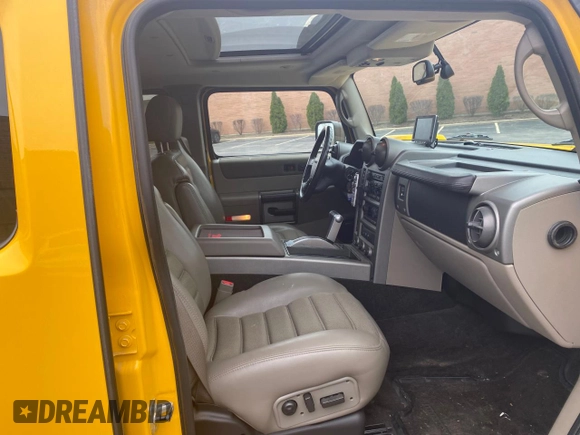 2003 Hummer H2 with VIN 5GRGN23UX3H112710, listed as a Copart auction lot 53854185 with 64,686 mi miles and Salvage Title. Bid and sale history available at carsss.com. Image 5.