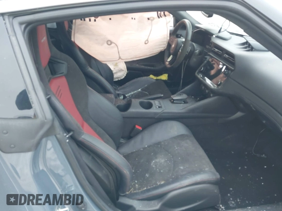 2024 Nissan Z Nismo with VIN JN1BZ4CH6RM360311, listed as a IAAI auction lot 41596881 with 8,916 mi miles and . Bid and sale history available at DreamBid. Image 5.