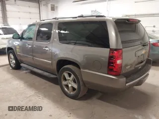 2012 Chevrolet Suburban LTZ with VIN 1GNSKKE79CR180400, listed as a IAAI auction lot 41807195 with 154,410 mi miles and . Bid and sale history available at carsss.com. Image 3.