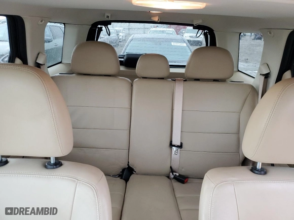 2011 Ford Escape Limited with VIN 1FMCU0E79BKC51335, listed as a Copart auction lot 50434385 with 115,961 mi miles and Salvage Title. Bid and sale history available at carsss.com. Image 10.