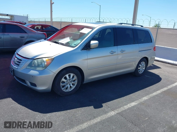 2008 Honda Odyssey EX-L with VIN 5FNRL38758B008724, listed as a IAAI auction lot 42202383 with 199,977 mi miles and . Bid and sale history available at DreamBid. Image 2.