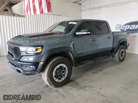 2021 Ram 1500 with VIN 0K1905786880, listed as a Copart auction lot 61756114 with 34,927 mi miles and Clean title. Bid and sale history available at DreamBid. Image 1.