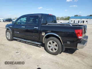 2010 Nissan Titan SE with VIN 1N6BA0ED4AN312650, listed as a Copart auction lot 47284915 with 266,394 mi miles and Salvage Title. Bid and sale history available at carsss.com. Image 2.