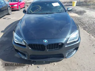 2017 BMW M6 z VIN WBS6E9C58HG437411, wystawiony jako IAAI lot #41636164 z przebiegiem 52 724 mil mil oraz . Historia ofert i sprzedaży dostępna na DreamBid. Obrazek 12.