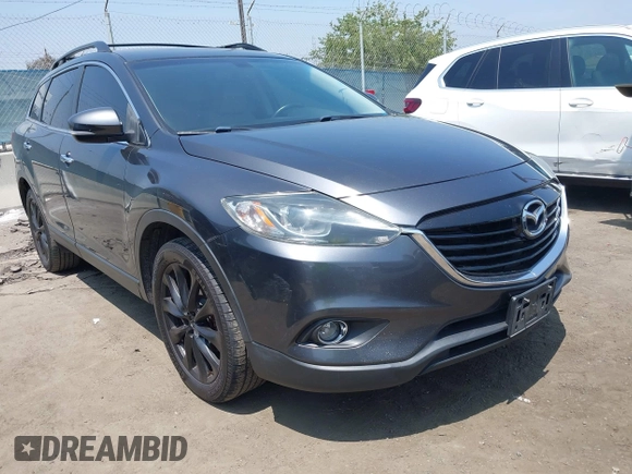 2015 Mazda CX-9 Grand Touring with VIN JM3TB3DA0F0459024, listed as a IAAI auction lot 42452288 with 174,716 mi miles and . Bid and sale history available at DreamBid. Image 1.