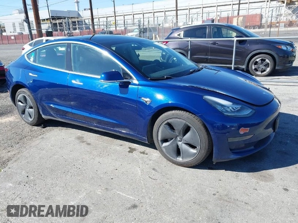 2019 Tesla Model 3 Mid Range with VIN 5YJ3E1EA8KF436086, listed as a IAAI auction lot 41682093 with 70,332 mi miles and . Bid and sale history available at DreamBid. Image 1.