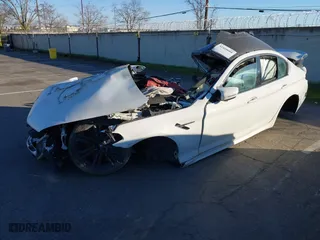 2019 BMW M5 with VIN WBSJF0C50KB284594, listed as a IAAI auction lot 41410008 with 1 mi miles. Bid and sale history available at carsss.com. Image 2.