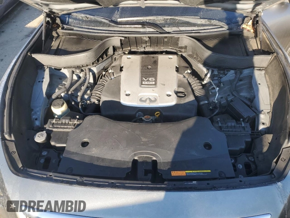 2014 Infiniti QX70 with VIN JN8CS1MU0EM452061, listed as a Copart auction lot 41790215 with 122,408 mi miles and Salvage Title. Bid and sale history available at DreamBid. Image 12.