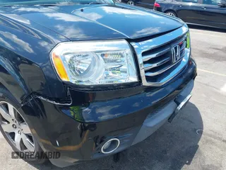 2013 Honda Pilot Touring z VIN 5FNYF3H98DB023104, wystawiony jako IAAI lot #42310538 z przebiegiem 169 385 mil mil oraz . Historia ofert i sprzedaży dostępna na DreamBid. Obrazek 17.