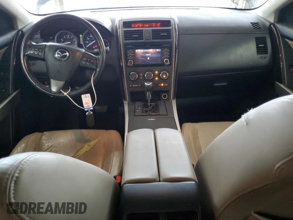 2014 Mazda CX-9 Grand Touring with VIN JM3TB3DA7E0439741, listed as a Copart auction lot 58908805 with 170,604 mi miles and Salvage title. Bid and sale history available at DreamBid. Image 8.