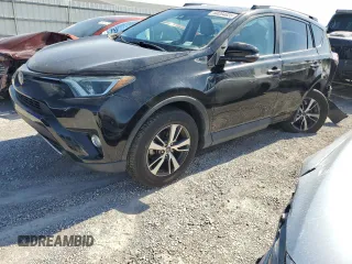 2018 Toyota RAV4 XLE with VIN 2T3WFREV5JW521276, listed as a Copart auction lot 60284625 with 95,014 mi miles and Salvage title. Bid and sale history available at DreamBid. Image 1.