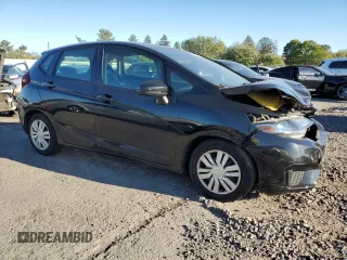 2016 Honda Fit LX with VIN 3HGGK5H56GM704864, listed as a Copart auction lot 75690264 with 54,543 mi miles and Salvage title. Bid and sale history available at DreamBid. Image 4.