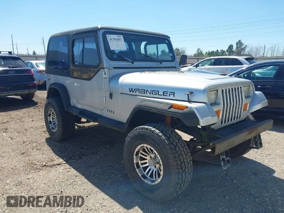1994 Jeep Wrangler S with VIN 1J4FY19P9RP438376, listed as a IAAI auction lot 41751057 with 165,407 mi miles. Bid and sale history available at carsss.com. Image 1.