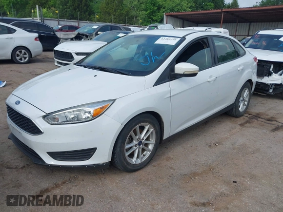 2015 Ford Focus SE with VIN 1FADP3F22FL376042, listed as a IAAI auction lot 42283236 with 76,675 mi miles and . Bid and sale history available at DreamBid. Image 2.