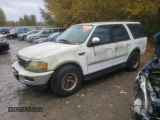 1997 Ford Expedition XLT z VIN 1FMEU17L6VLA61113, wystawiony jako Copart lot #73465703 z przebiegiem 184 878 mil mil oraz Czysty tytuł • Clean title. Historia ofert i sprzedaży dostępna na DreamBid. Obrazek 1.