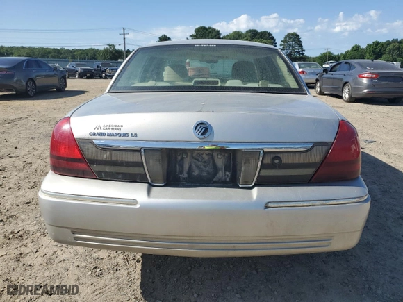 2010 Mercury Grand Marquis LS with VIN 2MEBM7FV8AX601912, listed as a Copart auction lot 57485494 with 60,696 mi miles and Salvage Title. Bid and sale history available at carsss.com. Image 6.