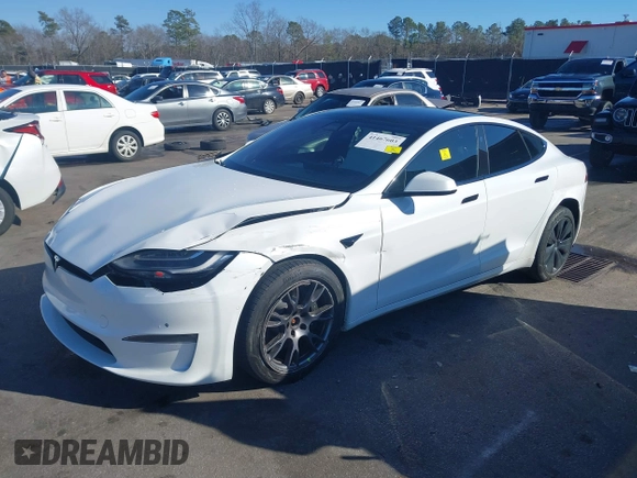 2021 Tesla Model S Long Range with VIN 5YJSA1E56MF453711, listed as a IAAI auction lot 41467603 with 115,634 mi miles and . Bid and sale history available at DreamBid. Image 19.