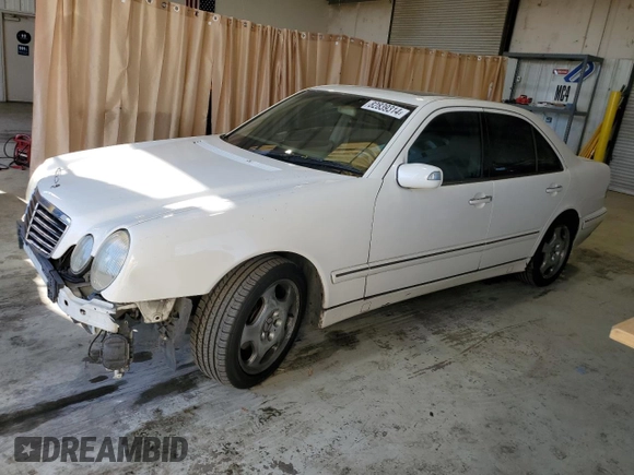 2002 Mercedes-Benz E-Class with VIN WDBJF70J82B449047, listed as a Copart auction lot 82839314 with 170,710 mi miles and Salvage Title. Bid and sale history available at carsss.com. Image 1.