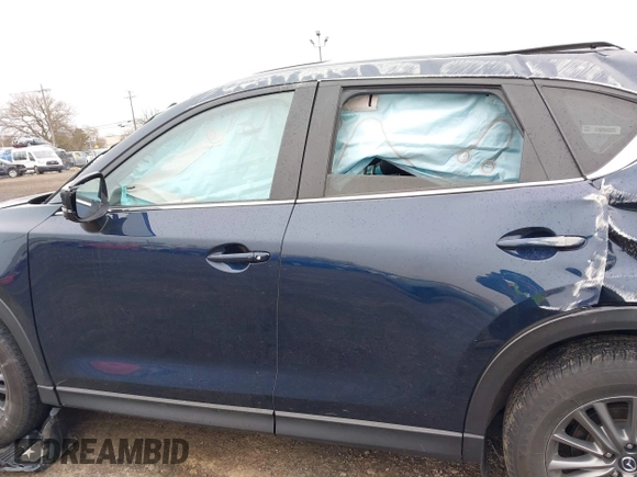 2020 Mazda CX-5 Touring with VIN JM3KFBCM9L0799502, listed as a IAAI auction lot 42007207 with 43,364 mi miles. Bid and sale history available at carsss.com. Image 13.