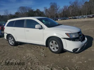2012 Dodge Journey SXT z VIN 3C4PDDBG1CT217441, wystawiony jako Copart lot #43275685 z przebiegiem 151 651 mil mil oraz Szkoda całkowita • Salvage title. Historia ofert i sprzedaży dostępna na DreamBid. Obrazek 4.