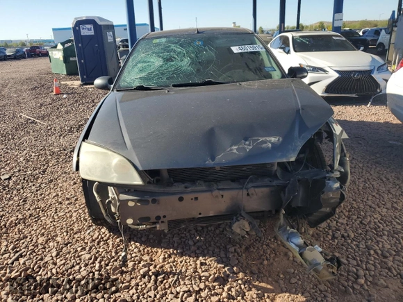 2005 Ford Focus S with VIN 3FAFP31NX5R154035, listed as a Copart auction lot 48015915 with Not Provided miles and Salvage Title. Bid and sale history available at carsss.com. Image 5.