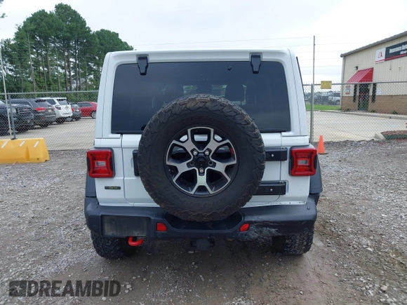 2021 Jeep Wrangler Unlimited Rubicon with VIN 1C4JJXFM9MW774142, listed as a IAAI auction lot 42625007 with 42,318 mi miles and . Bid and sale history available at DreamBid. Image 16.