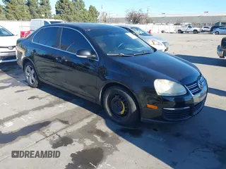 2008 Volkswagen Jetta SE z VIN 3VWRZ71K18M166457, wystawiony jako IAAI lot #41392289 z przebiegiem 244 330 mil mil oraz . Historia ofert i sprzedaży dostępna na DreamBid. Obrazek 1.
