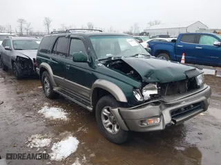 2000 Toyota 4Runner Limited with VIN JT3HN87R6Y0265299, listed as a IAAI auction lot 41569862 with 216,917 mi miles. Bid and sale history available at carsss.com. Image 1.