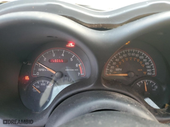 2004 Pontiac Grand Am GT1 with VIN 1G2NV52E14M667692, listed as a Copart auction lot 73339504 with 156,066 mi miles and Salvage Title. Bid and sale history available at carsss.com. Image 9.