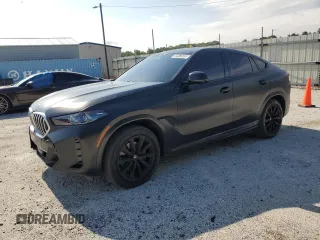 2024 BMW X6 xDrive40i z VIN 5UX33EX00R9V74192, wystawiony jako Copart lot #59872505 z przebiegiem 30 458 mil mil oraz Czysty tytuł • Clean title. Historia ofert i sprzedaży dostępna na DreamBid. Obrazek 1.