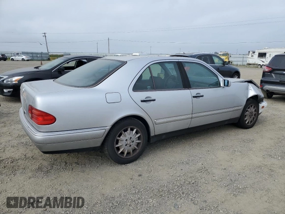 1999 Mercedes-Benz E-Class with VIN WDBJF65H0XA797390, listed as a Copart auction lot 55081405 with 80,950 mi miles and Salvage Title. Bid and sale history available at carsss.com. Image 3.