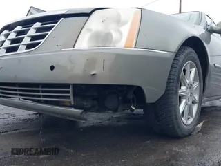 2010 Cadillac DTS 1SC z VIN 1G6KD5EY3AU134362, wystawiony jako IAAI lot #41579786 z przebiegiem 131 969 mil mil oraz . Historia ofert i sprzedaży dostępna na DreamBid. Obrazek 6.