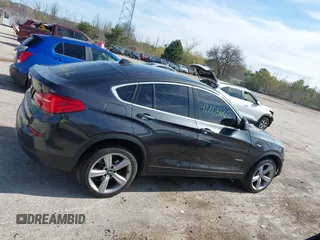 2017 BMW X4 xDrive28i with VIN 5UXXW3C36H0T79679, listed as a IAAI auction lot 42203662 with 137,863 mi miles and . Bid and sale history available at DreamBid. Image 13.