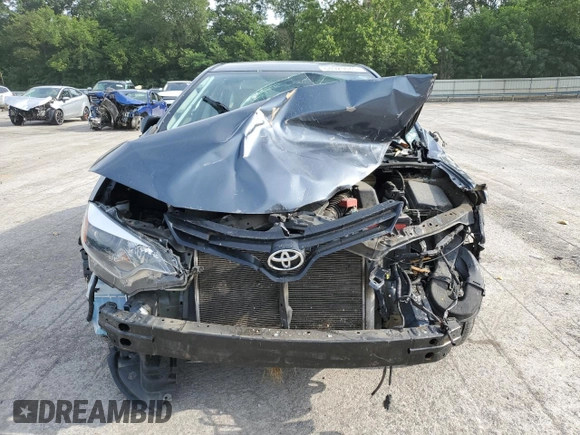 2014 Toyota Corolla L z VIN 2T1BURHE9EC123570, wystawiony jako Copart lot #64929045 z przebiegiem 128 731 mil mil oraz Szkoda całkowita • Salvage title. Historia ofert i sprzedaży dostępna na DreamBid. Obrazek 5.