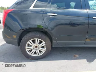 2014 Cadillac SRX with VIN 3GYFNAE30ES641616, listed as a IAAI auction lot 42000120 with 145,000 mi miles and . Bid and sale history available at DreamBid. Image 14.